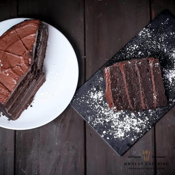 Triple Fudge Towering Chocolate Cake